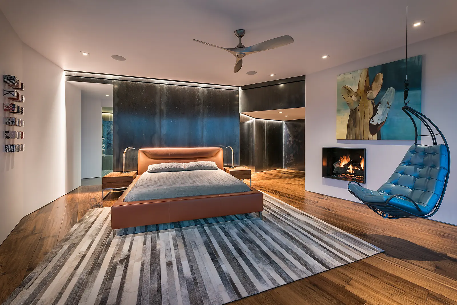 Sleek bedroom design with hanging chair