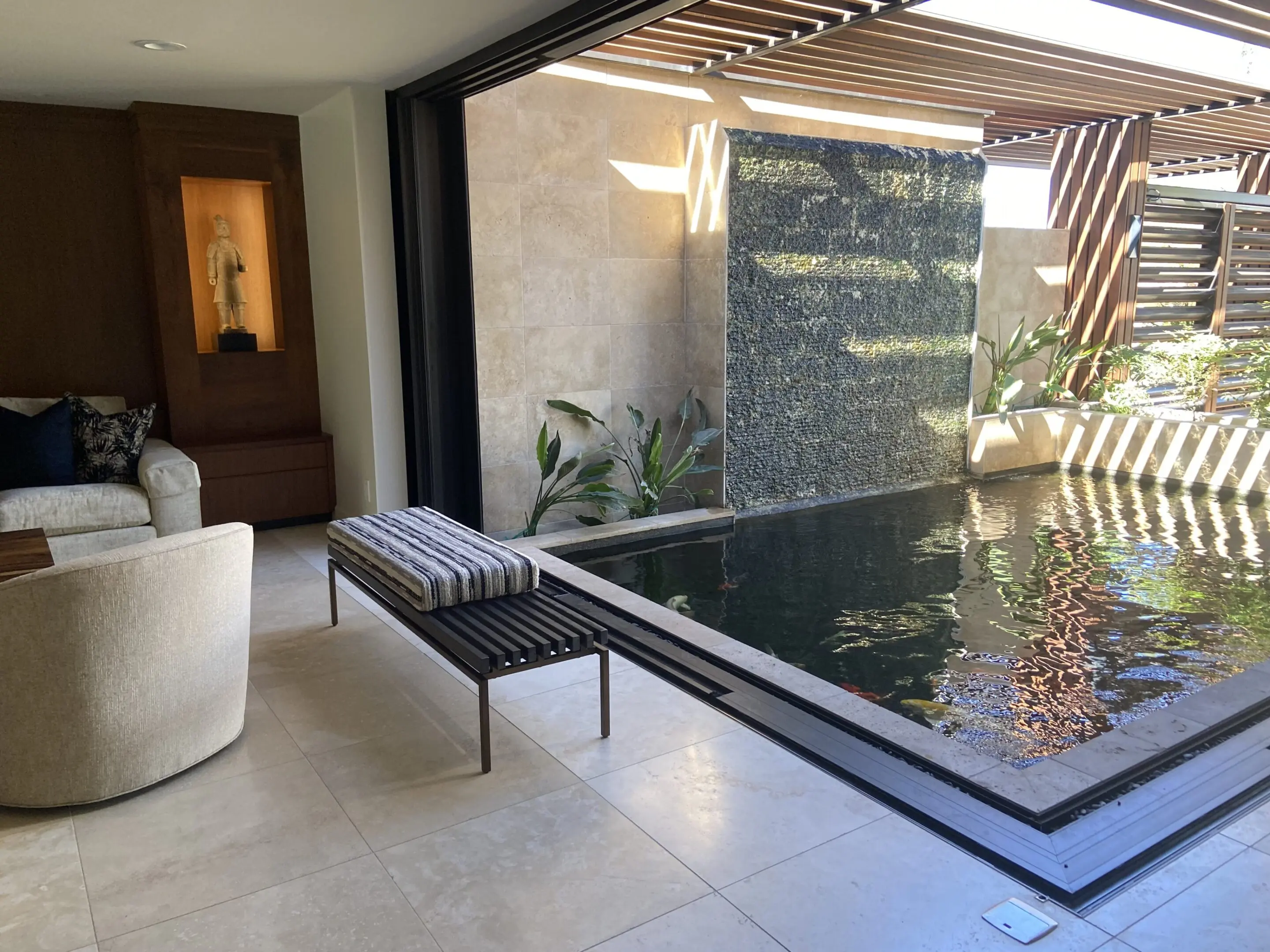 Luxurious room featuring a water feature