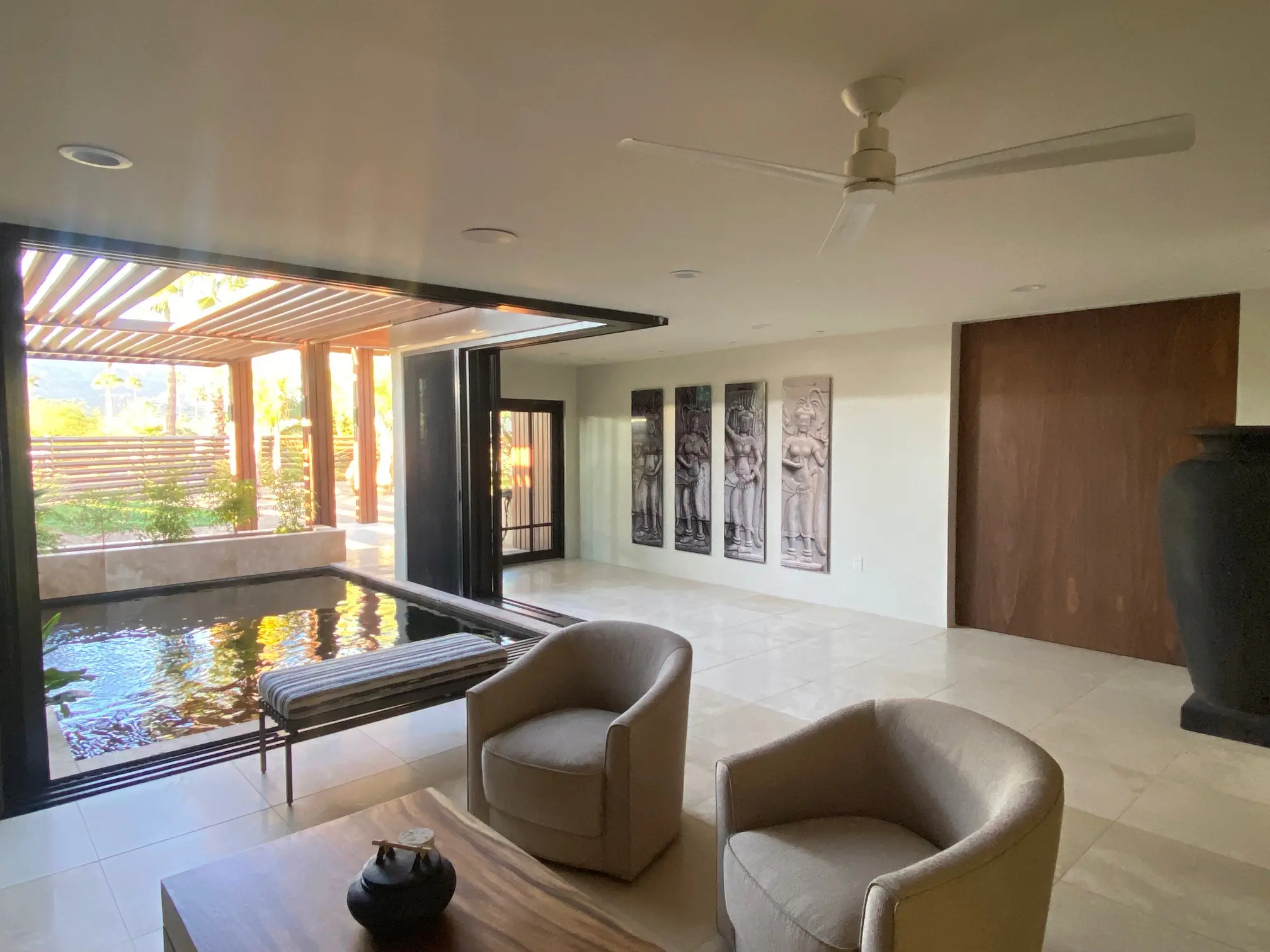 Modern living room with neutral tones and natural light.