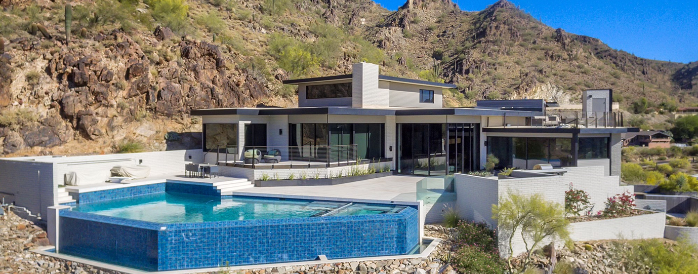 Modern hillside home with infinity pool
